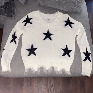 Main Strip white and black star sweater size medium